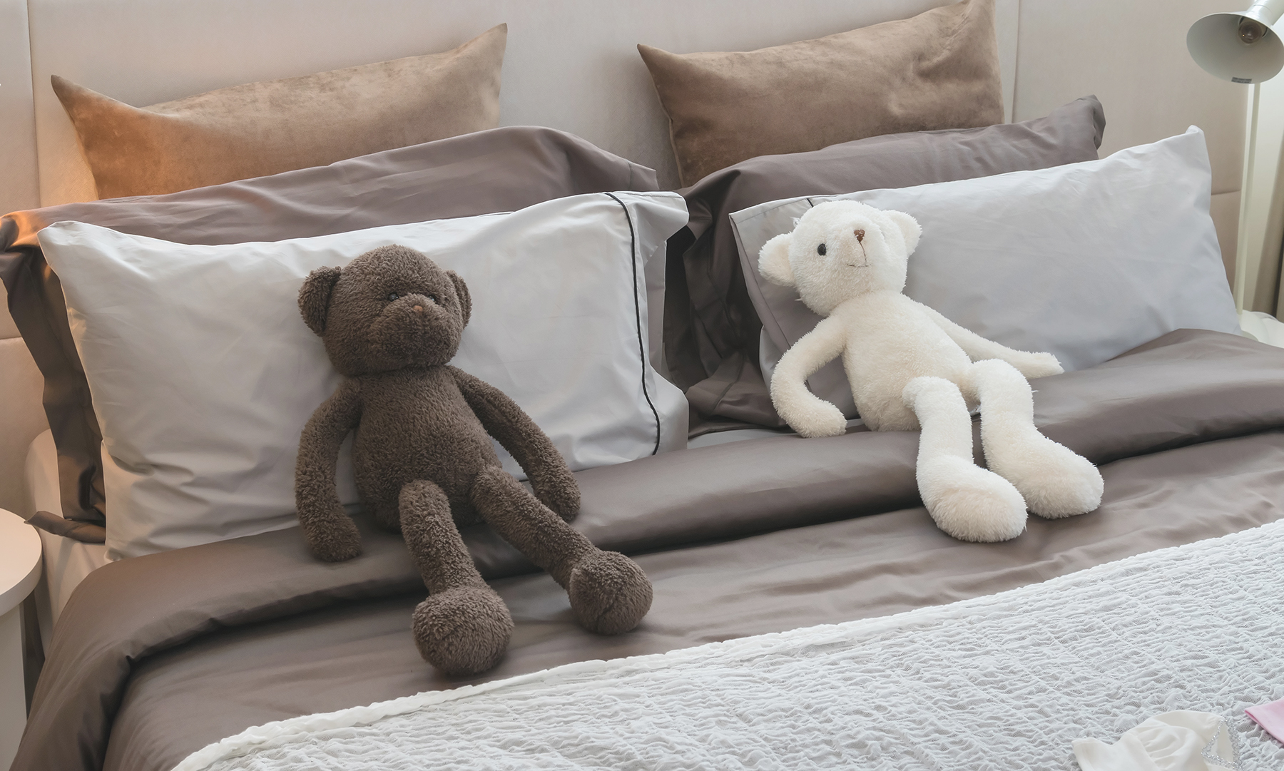 kids room with dolls and pillows on bed at home Philadelphia Nanny