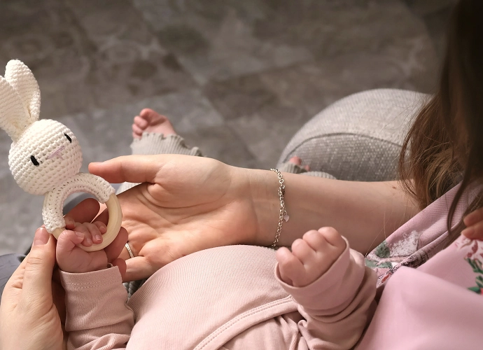 Experienced nanny engaging with children at home