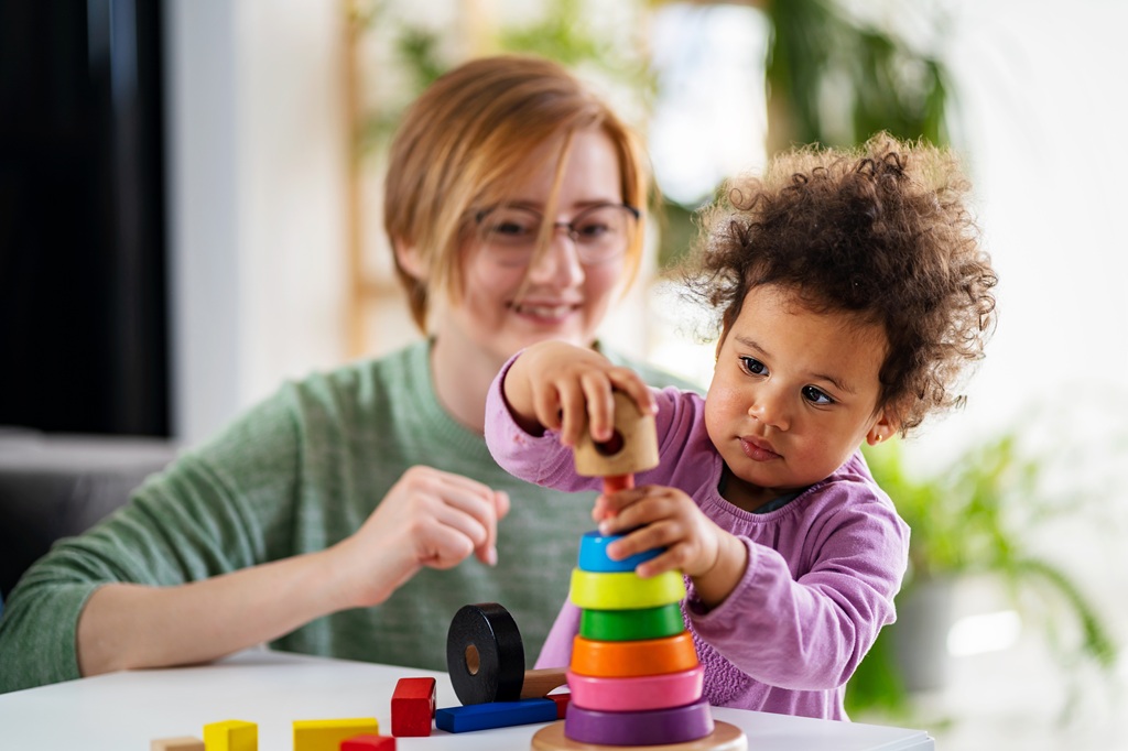 Family enjoying support from trusted in-home childcare services