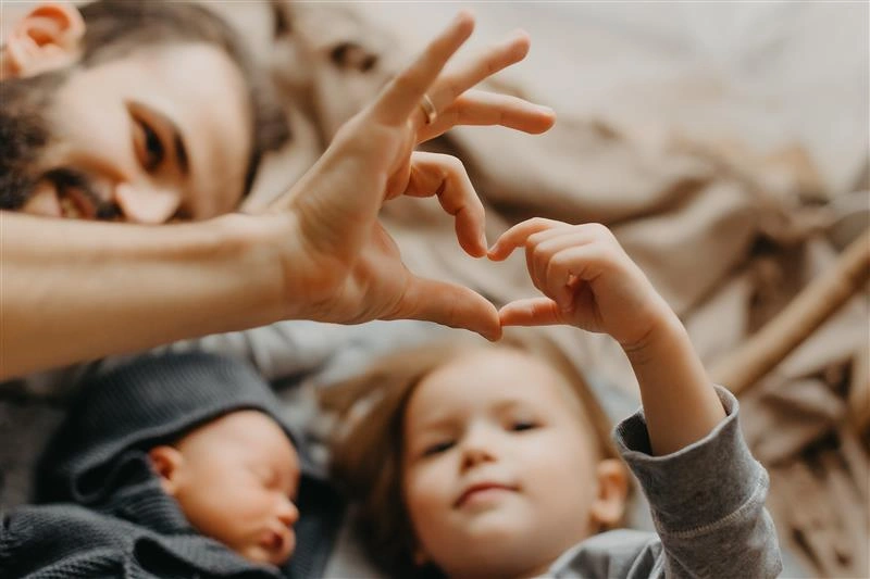 Nanny providing attentive care and supervision to children