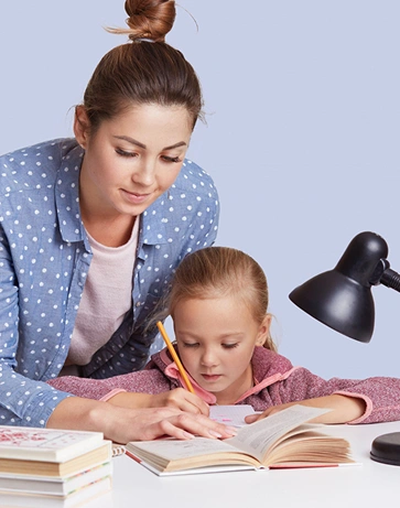 Nanny supporting child development through play and learning