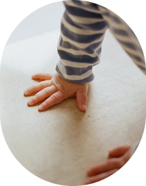 Nanny helping children learn and grow through daily activities